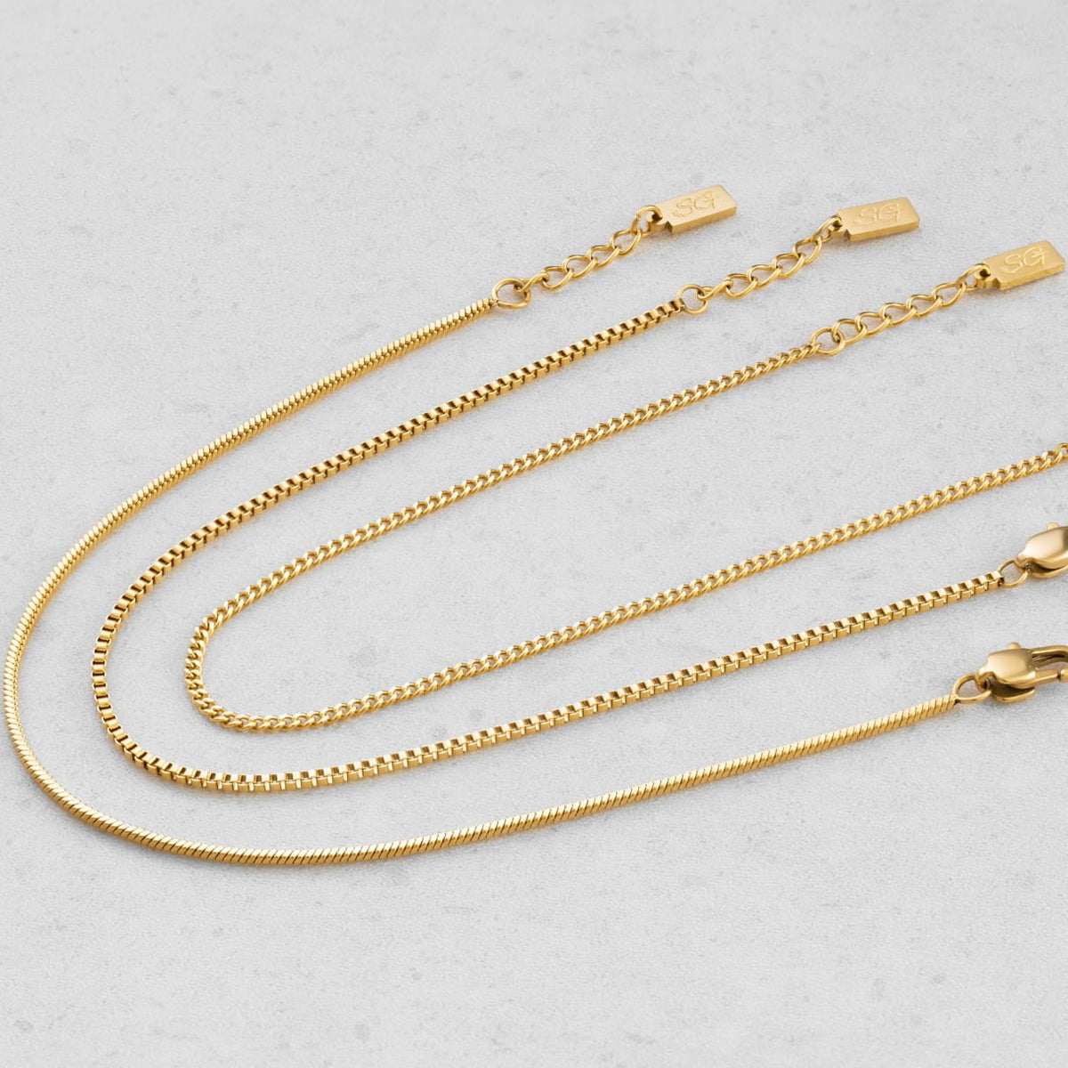 Minimal Bracelet Stack - gold-toned chains sleek polished finish