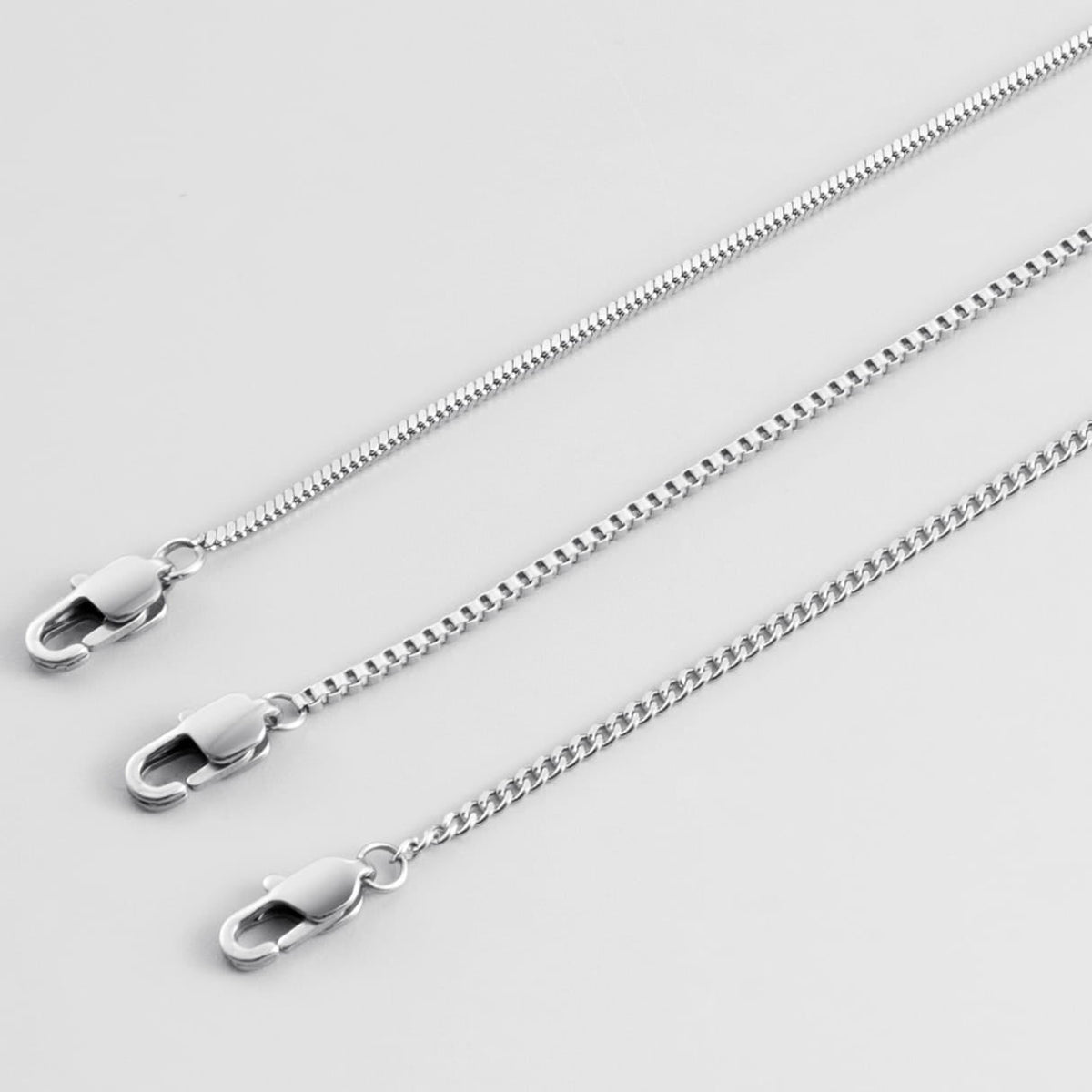 Minimal Bracelet Stack - Silver - three silver-toned chain necklaces link