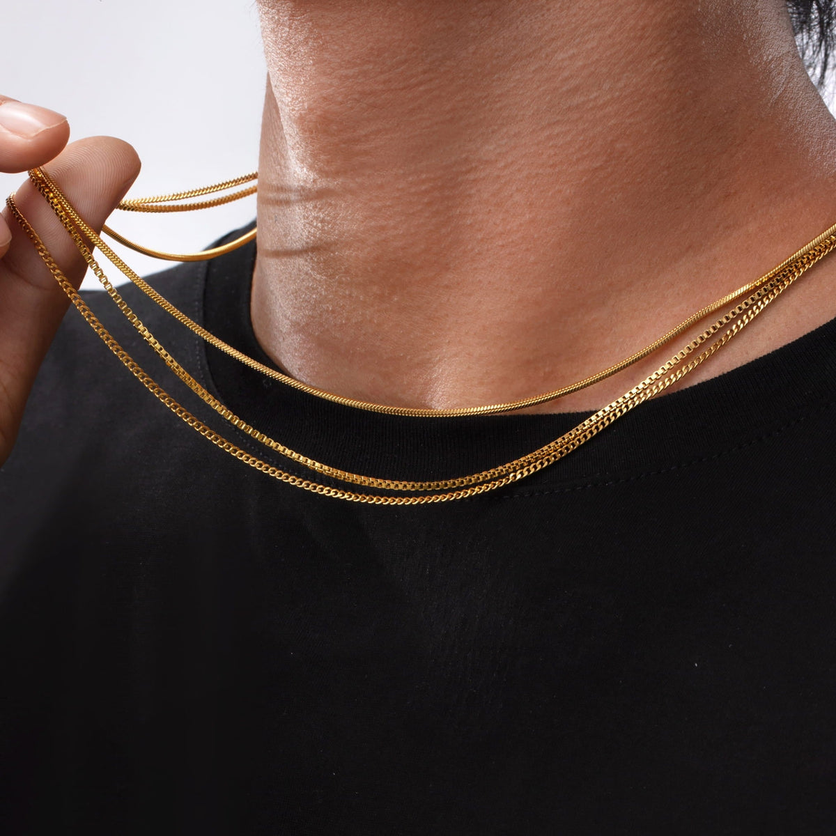 Minimal Chain Stack - gold-colored multi-link chain necklaces black