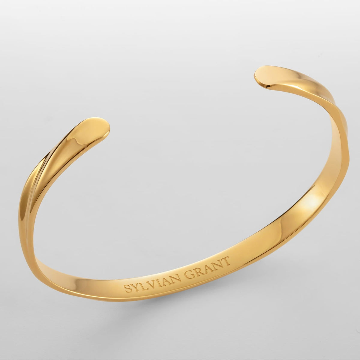 Twisted Unisize Cuff - gold-toned open cuff bracelet sleek