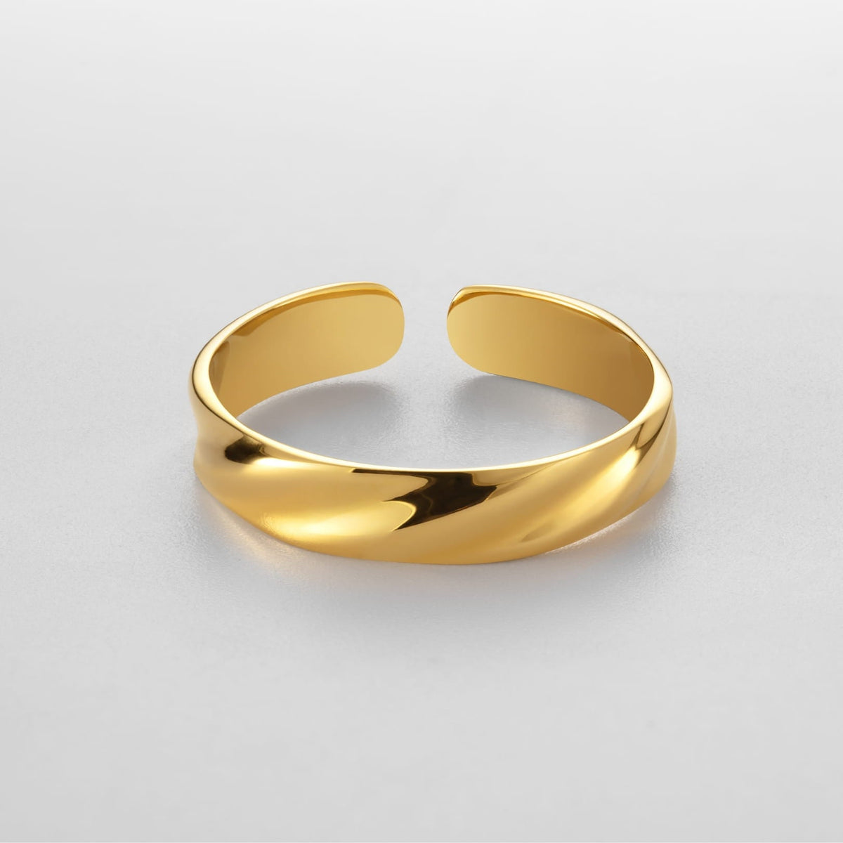 Twisted Unisize Ring - Gold - sleek gold-toned open ring twisted